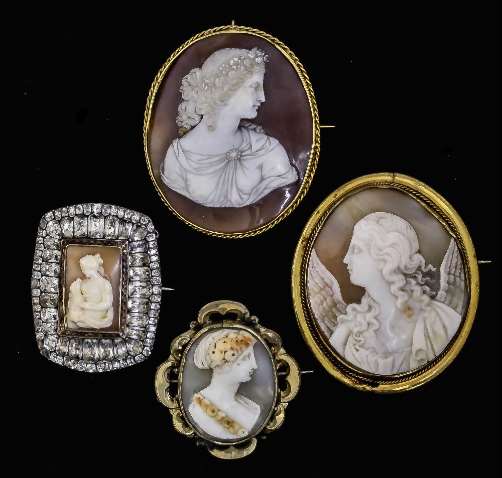 An early 19th Century silvery metal and paste mounted c: An early 19th Century silvery metal and paste mounted cameo brooch, the oblong central panel, 25mm x 15mm overall, carved with a portrait of a seated woman with a dog on her lap (gross weight 20 gramm