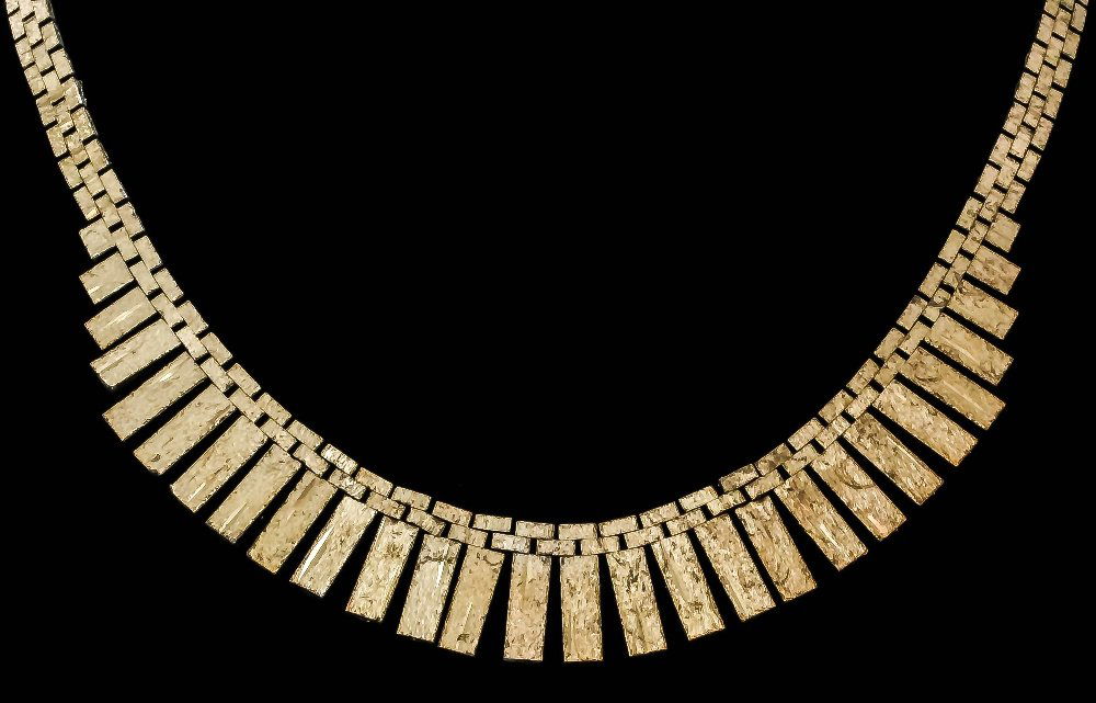 A 1970s 9ct gold textured bark pattern “Cleopatra” neck: A 1970s 9ct gold textured bark pattern “Cleopatra” necklace, 425mm x 15mm overall (gross weight 32 grammes)