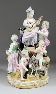 A 19th Century Meissen porcelain group of children in v: A 19th Century Meissen porcelain group of children in various pursuits (minor damage)