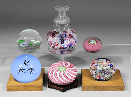 A modern Baccarat glass paperweight with three swallows: A modern Baccarat glass paperweight with three swallows, 3ins diameter, and five other glass paperweights, various