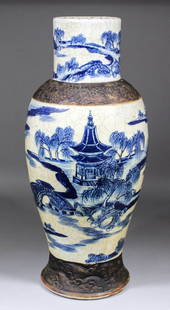 A Chinese “Crackleware” vase moulded in shallow relief : A Chinese “Crackleware” vase moulded in shallow relief and painted with a river landscape, 22.25ins (565mm) high (impressed square seal mark to base)