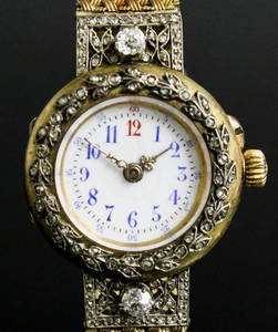 An early 20th Century French lady's gold and silvery