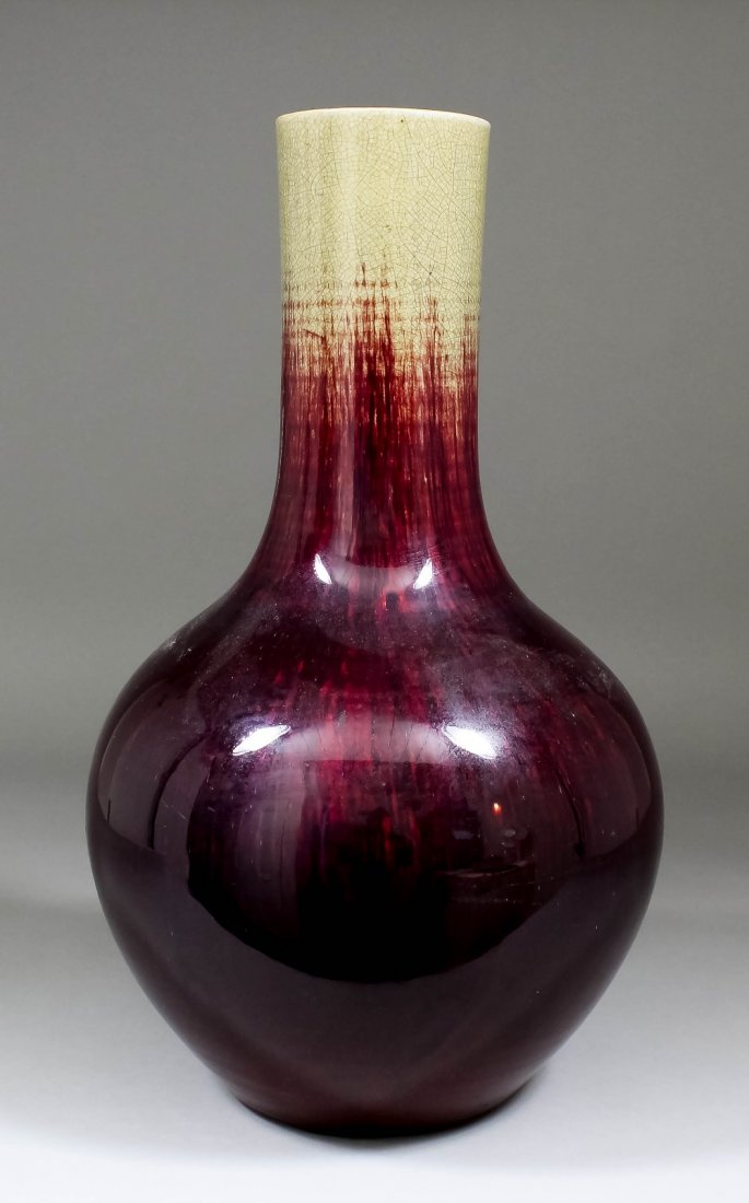 A Chinese flambe glazed stoneware bottle vase, 16ins
