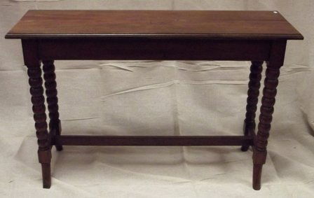 Victorian walnut centre table, rectangular top with mou: Victorian walnut centre table, rectangular top with moulded rim, on bobbin turned supports united by plain stretchers, stamped John Taylor & Son, Edinburgh, H1805, 44.5 x 14in.