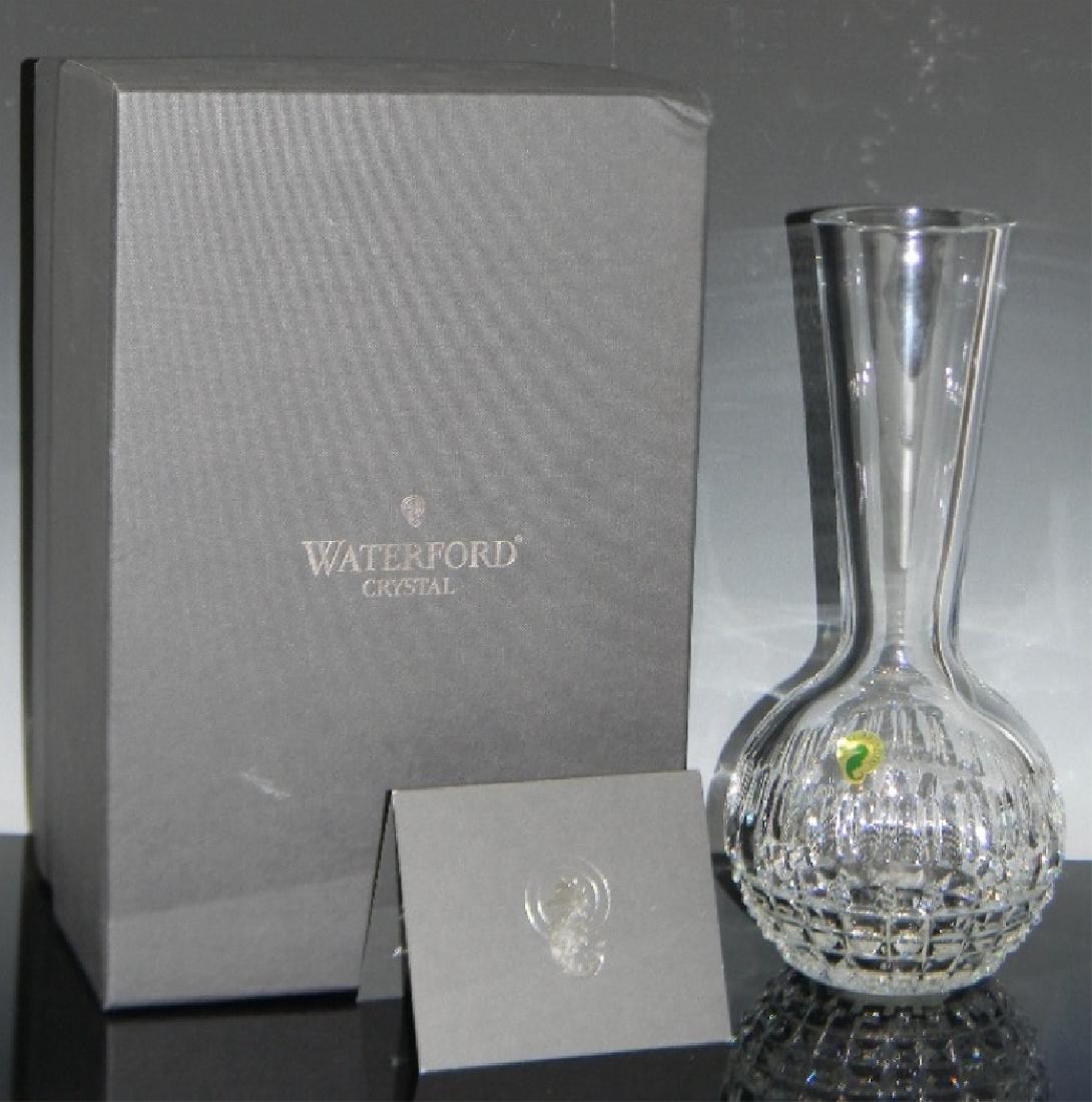 WATERFORD CRYSTAL FLEUROLOGY CAROLINE BUBBLE VASE: WATERFORD CRYSAL FLEUROLOGY CAROLINE BUBBLE VASE: A globular body with a tall conical neck and mouth, 11"h. This piece has a Retail price of $300USD.