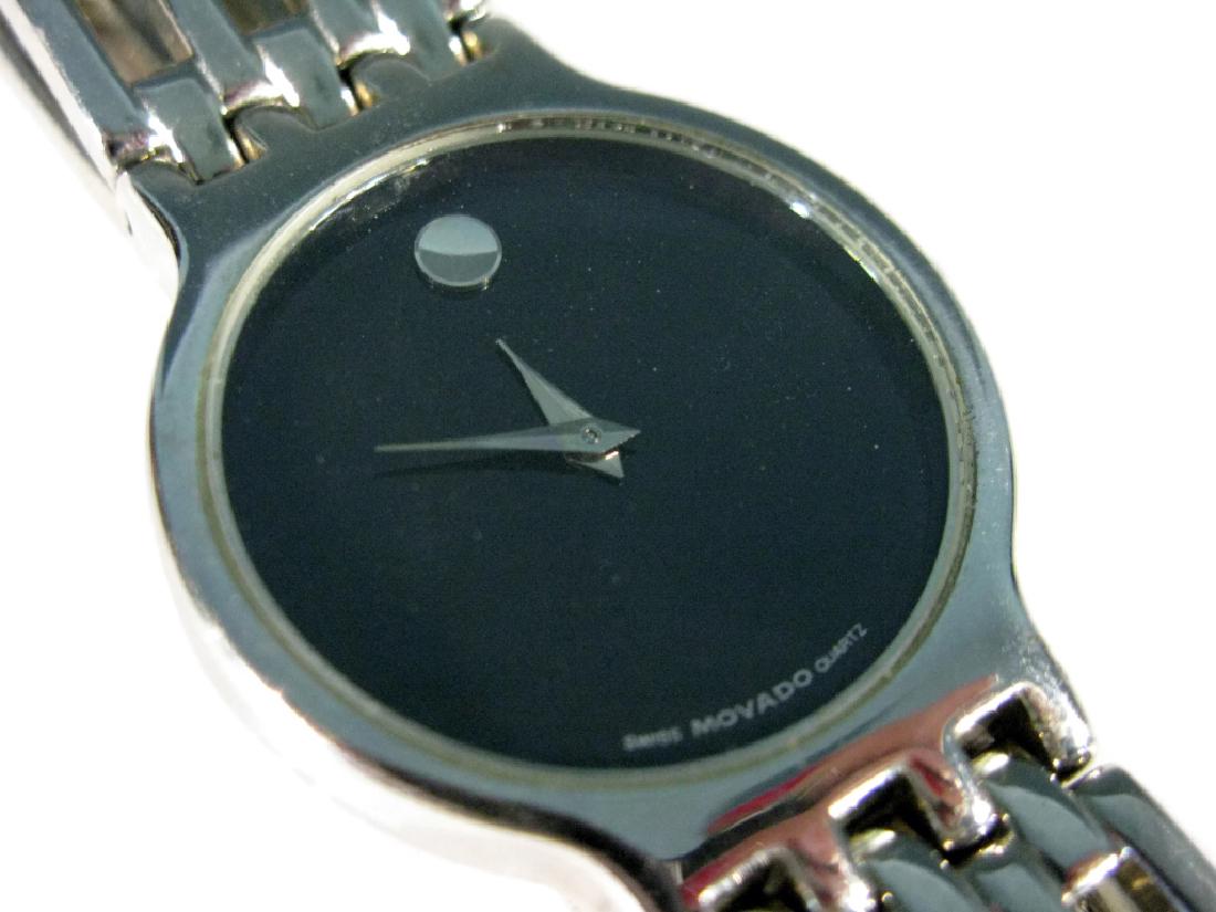 MENS MOVADO BLACK SERIO MUSEUM WATCH: MENS MOVADO BLACK SERIO MUSEUM WATCH AND STAINLESS BRACELET