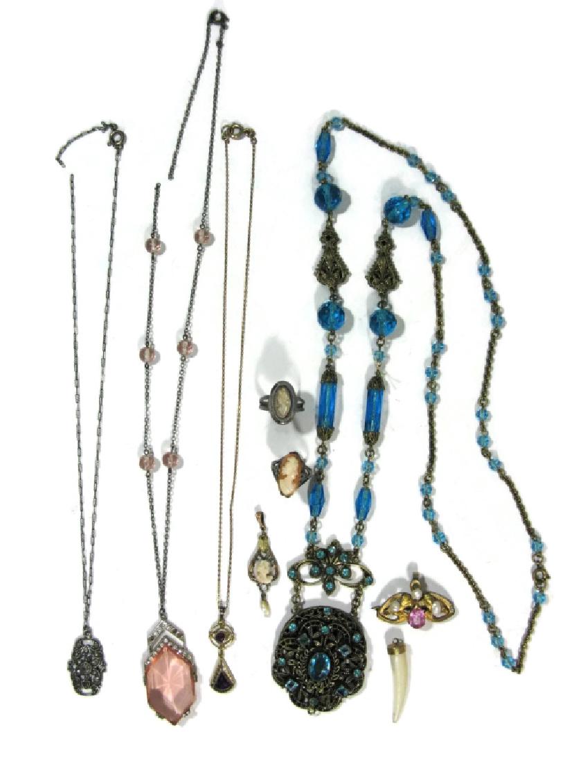 ANTIQUE JEWELRY GOLD & STERLING NECKLACES PENDANTS: ANTIQUE JEWELRY GOLD & STERLING: 3 necklaces, one sterling silver with a marcasite pendant and another sterling silver with a large pink faceted glass & rhinestone pendant. One long Czechoslovakian ne