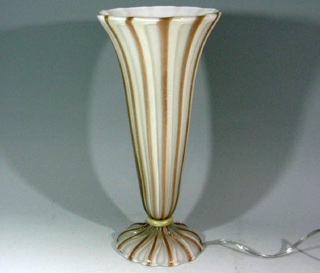 BAROVIER MURANO GLASS TRUMPET MOUTH LAMP 16.5"h: BAROVIER TOSO MURANO GLASS TRUMPET MOUTH LAMP 16.5"h: The foot and body gently ribbed and accenting bands and flecks of aventurine gold cased in a clear exterior and white interior. Professionally rew