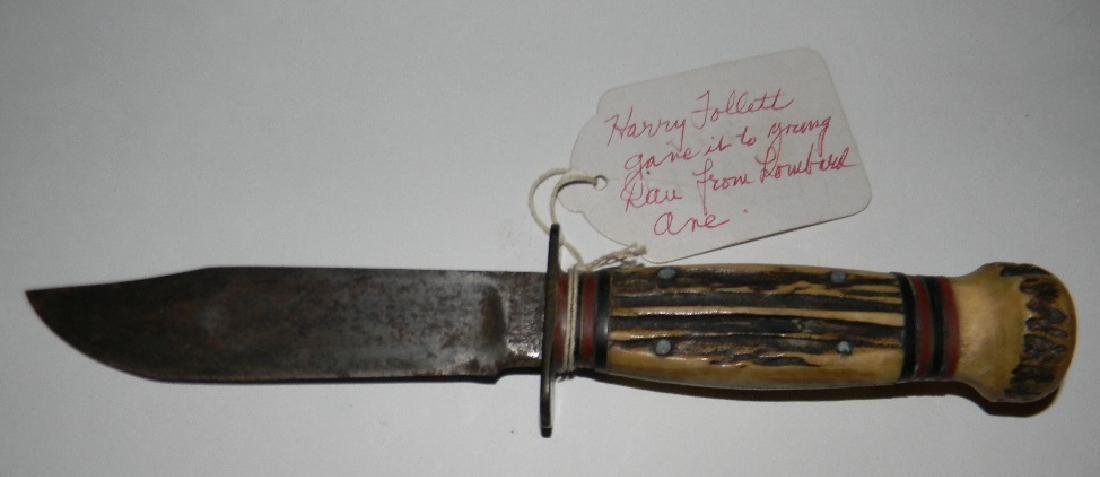 MARBLES GLADSTONE BOY SCOUT KNIFE ANTLER HANDLE: MICHIGAN MARBLES GLADSTONE BOY SCOUT KNIFE ANTLER HANDLE: Bone handle with red and black spacers, Blade impressed: MARBLES GLADSTONE MICH. U.S.A, 6.75"l. Includes a hang tag reading, "Danny Jr Boy Sco