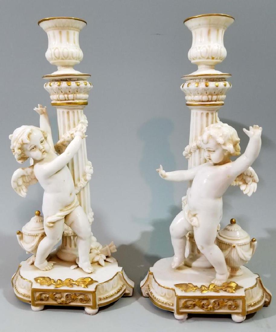 PORCELAIN CANDLESTICKS WITH COLUMNS & CHERUBS (1 of 5)