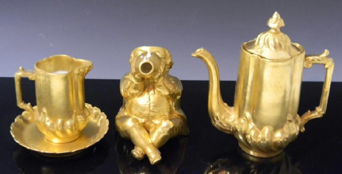 GROUP OF GILDED PORCELAIN INC TOBY JUG (1 of 6)