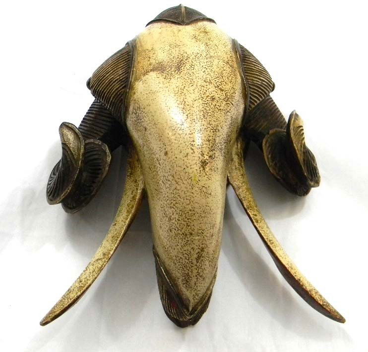 African Carved Wood Ram’s Head Mask: Ram’s Head Carved Wood Mask from the Ivory Coast. This piece measures 15”h x 12.5”w x 7”d.