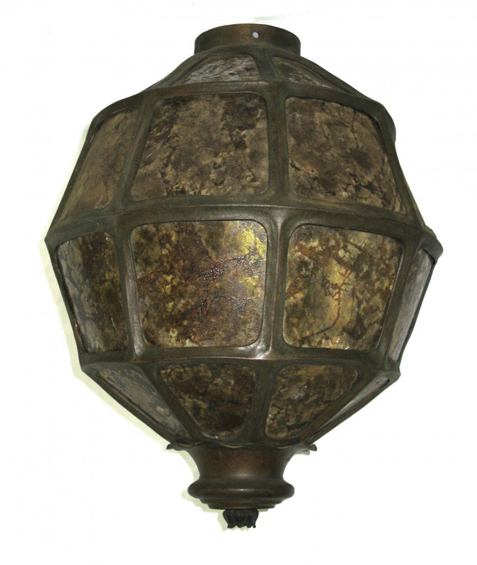 Mica and Metal Hanging Shade; style of Dirk van Erp: This is an antique hanging metal and mica panel lamp shade in the style of Dirk van Erp and of the time period. This piece measures 16"h x 13"d.