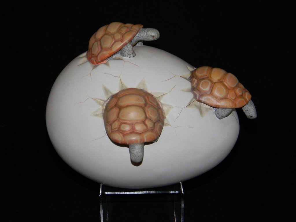 Sergio Bustamante (b. 1942) Ceramic Egg with Turtles: Sergio Bustamante (b. 1942) Egg with hatching, hand-painted ceramic turtles; 8.5"h x 8"d