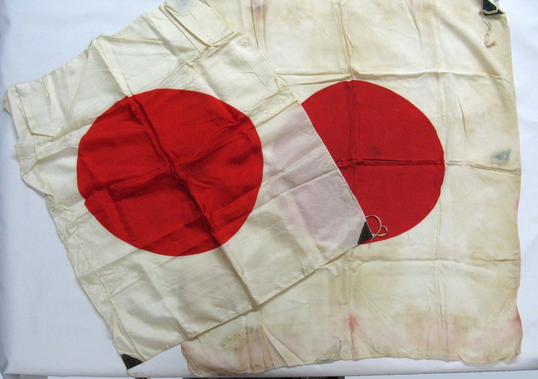 Pair of Japanese Silk Bring Back WWII Meatball Flags;: Provenance: descended through the family to the current owner's grandson a retired Florida policeman. 23" x 26"; 29" x 32"
