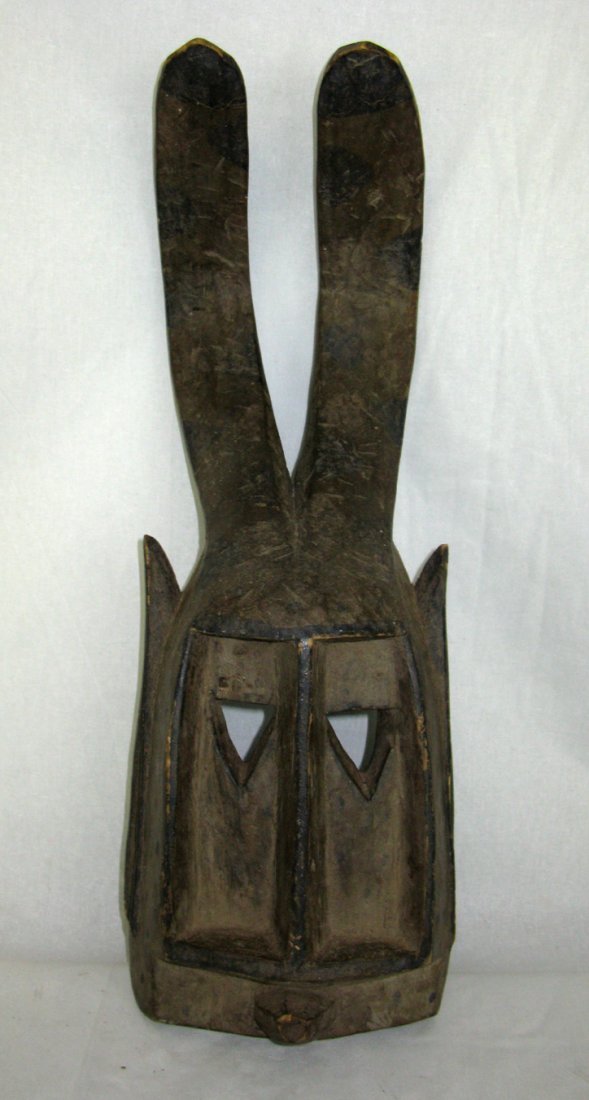 African Dogon Mali Carved Wood Animal Antelope Mask: African Dogon, Mali Carved Wood Antelope Mask with original pigment; measures 20"h x 7"l x 4.5"w.