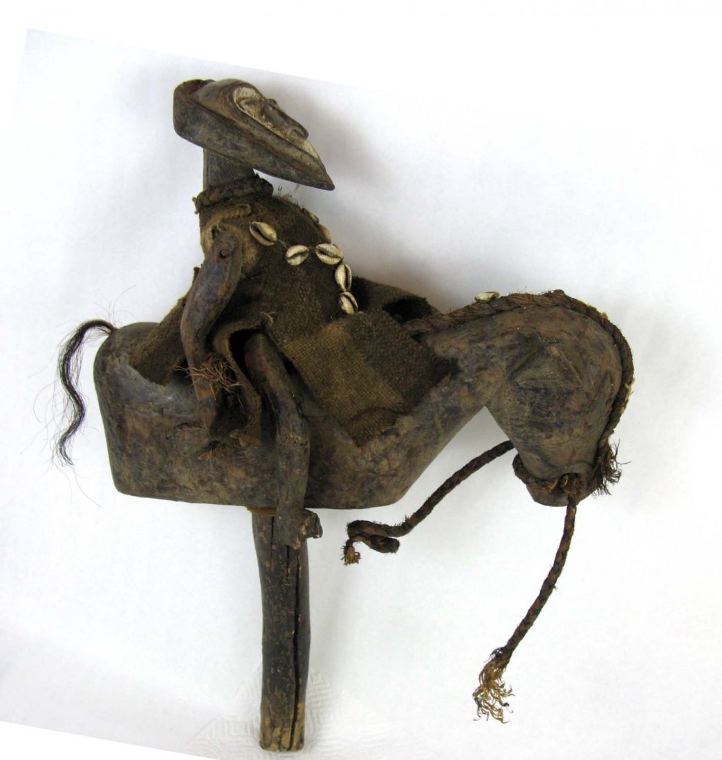 African Wood Horse and Rider Rod Puppet: African Horse and Rider rod puppet. Rider with Made of carved wood, metal, cowrie shells, fiber, hide and hair. 16 1/2"l x 15"h