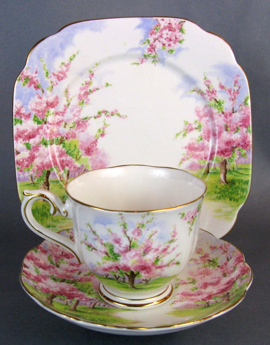 Vintage Royal Albert Blossom Time Porcelain Tea Trio: Vintage Royal Albert Bone China Porcelain Tea Trio in the Blossom Time pattern (1948 - 1997). Includes footed cup and saucer in the Hampton shape with 7" dessert/pie plate.