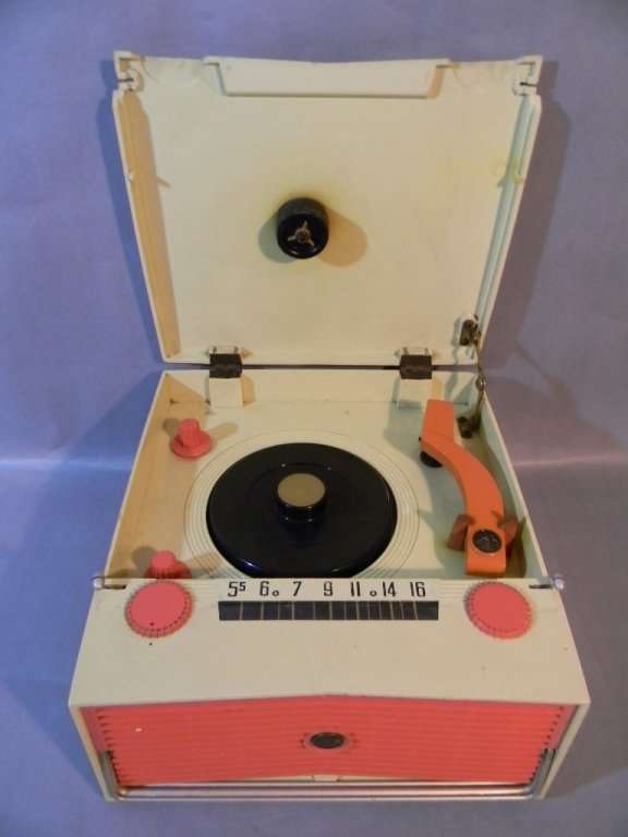 RCA Vintage Phonograph Tube Radio The Skipper"": RCA Victor The Skipper" AM radio & 45 RPM phonograph (record player), metal case and handle - 10.5" L x 11.5" W x 5.5" H. AC or battery operated. Does not include cord which had to be purchased separa