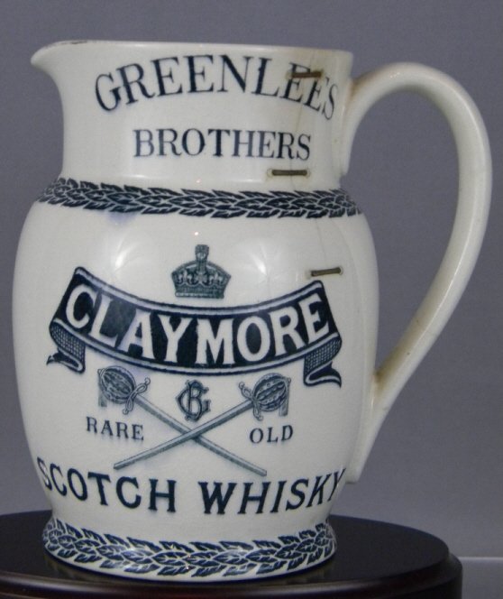 ROYAL DOULTON ADVERTISING CLAYMORE WHISKEY STAPLES: Greenlees Bros. Ceramic Advertising Jug produced by Royal Doulton c. 1924 for Claymore Scotch Whiskey, c 1910, 6 1/2"h.