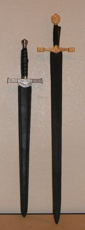 2 REPRODUCTION BROADSWORDS EXCALIBUR, MACLEOD: 2 REPRODUCTION BROADSWORDS; King Arthur's & EXCALIBUR (50 1/2l), and Sir William Wallace's Macleod Claymore Sword (43 1/2); each with sheath, each