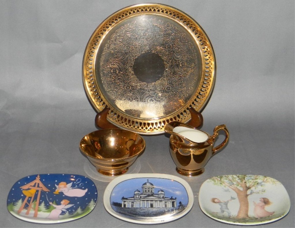 ARABIA FINLAND PORCELAIN LOT W/ SCANDIA GULD TRAY: ARABIA FINLAND PORCELAIN LOT W/ SCANDIA GULD TRAY; 4 porcelain plates each approx 4 3/4d and shiny gold cream and sugar, lot also includes a Scandia Guld reticulated tray.