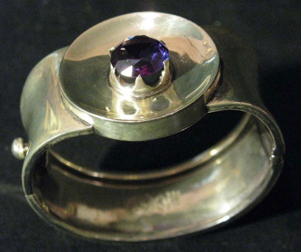 STERLING SILVER TAXCO DE LOS BALLESTEROS BRACELET: STERLING SILVER TAXCO TALLERES DE LOS BALLESTEROS BRACELET: Sterling silver, modernist cuff bracelet set with a central, faceted faux alexandrite. Stamped "Talleres de los Ballesteros / Taxco/ Sterlin