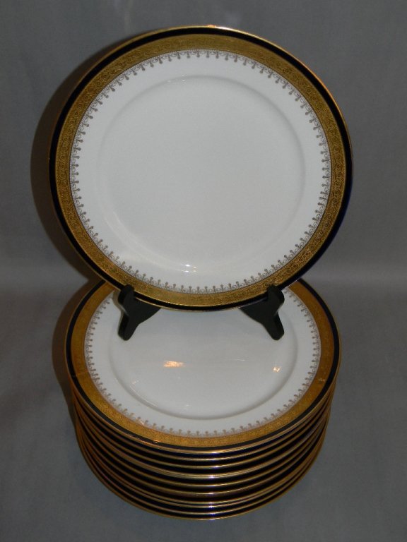 10 ROSENTHAL GILDED AND COBALT BLUE DINNER PLATES: 10 VINTAGE ROSENTHAL GILDED AND COBALT BLUE DINNER PLATES; Each with a gilded edge, cobalt border and a richly applied and etched inner gold band. Maker's mark on base with 1701, 10 3/8" D; Free of ch