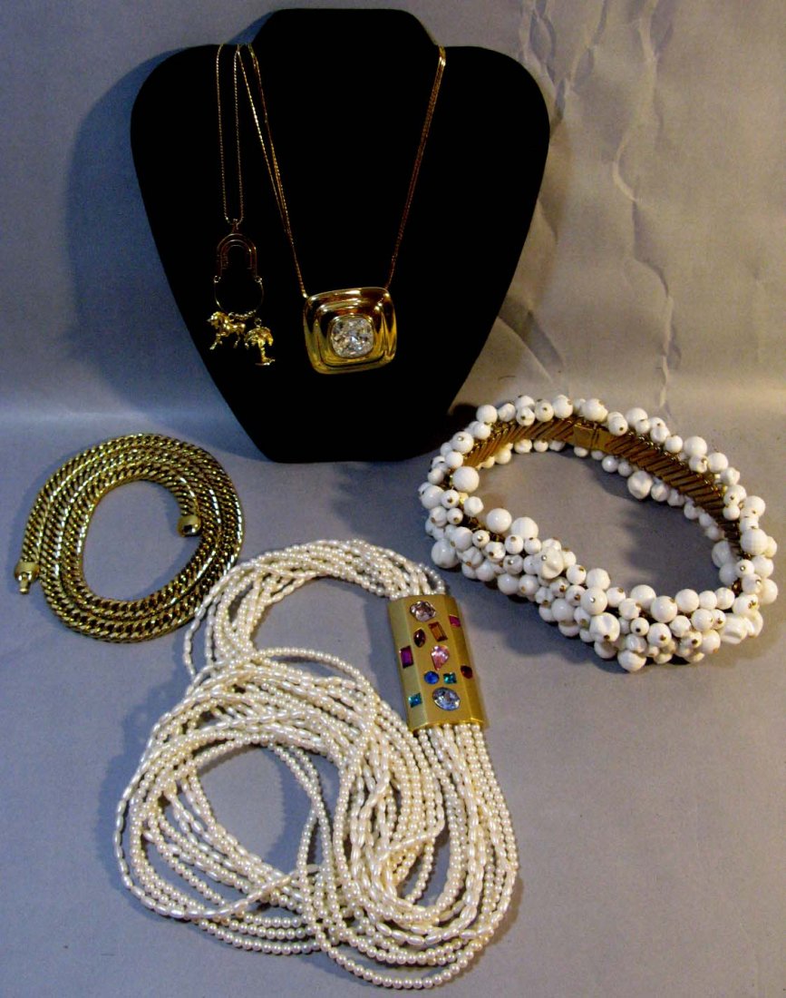 GIVENCHY MONET BRANIA COSTUME JEWELRY NECKLACES: GIVENCHY, MONET, BRANIA COSTUME JEWELRY NECKLACES: 5 Signed Costume Necklaces, lot to include: Brania collar necklace with white cast resin beads on an expandable metal collar, 16" L; Monet multi-stra