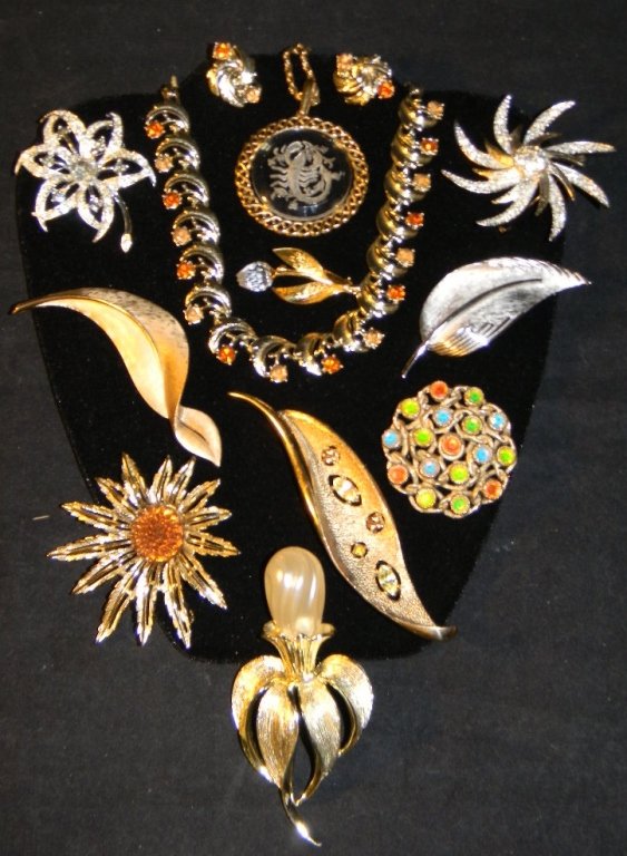 COLLECTION SIGNED RHINESTONE COSTUME JEWELRY: COLLECTION SIGNED RHINESTONE COSTUME JEWELRY: 12 piece lot, each piece signed by one of the following Sarah Cov, Emmons, Trifari, Coro and Swarovski; All in working condition and without any missing s