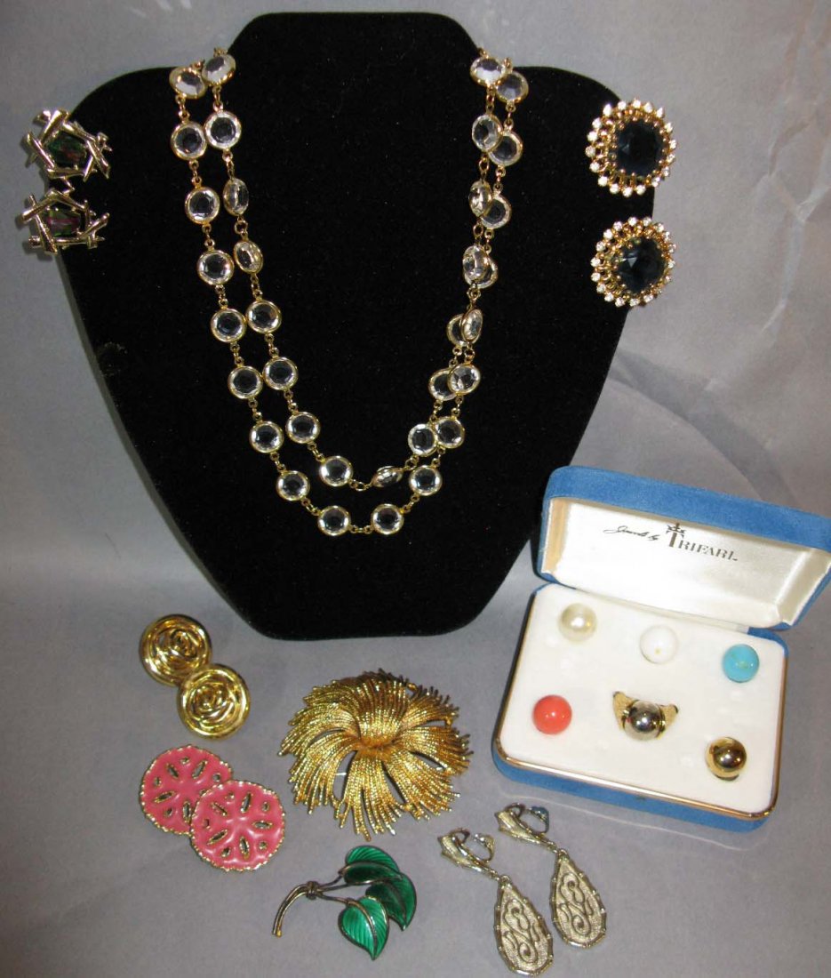 SIGNED COSTUME JEWELRY: MONET CORO GAY BOYER SARAH COV: COLLECTION OF COSTUME JEWELRY; Monet Brooch 2 1/2" D; Gay Boyer enameled Sand Dollar Earrings; Coro silver-Tone teardrop shaped earrings, Trifari Interchangeable Ring Set in the original Box. Castle C