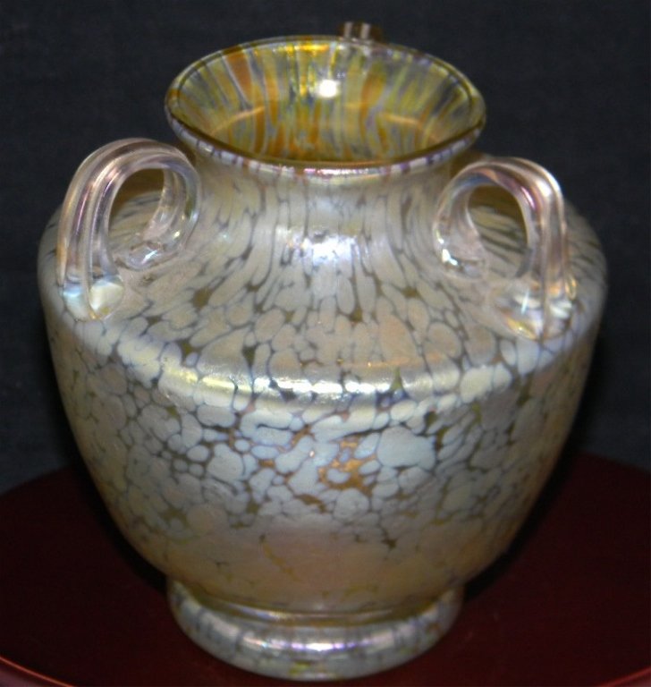 LOETZ CANDIA PAPILLON THREE HANDLED GLASS VASE: LOETZ CANDIA PAPILLON THREE HANDLED GLASS VASE: Three applied handles on a wide shouldered body with tapering foot, polished pontil; 4 3/4" H x 4" D.
