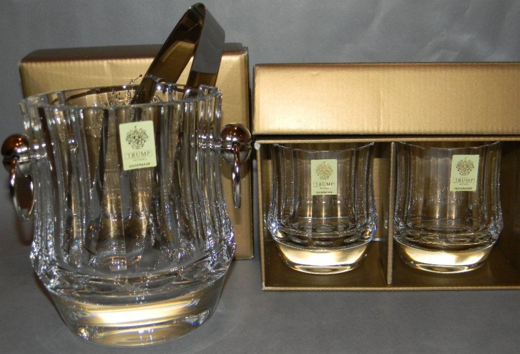ROGASKA CRYSTAL ICE BUCKET & DOUBLE OLD FASHIONED: ROGASKA CRYSTAL ICE BUCKET & DOUBLE OLD FASHIONED GLASSES: Made in the "Central Park" pattern by Rogaska Crystal for Trump Home; The elegant ice bucket with wasted sides and silver ring handles; 6 3/4