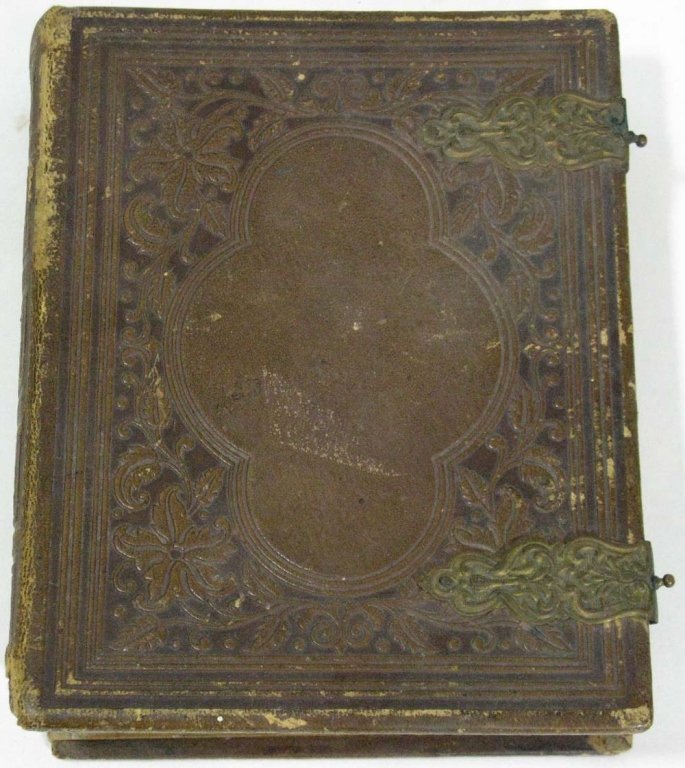 19TH C PHOTO ALBUM WITH 30 NAMED INDIVIDUALS: MID-19TH C PHOTO ALBUM WITH NAMED INDIVIDUALS: 30 total photographs; all with first and last names, several from Peters, Holt, Nyce, and others. IN embossed leather album with remnants of metal latche