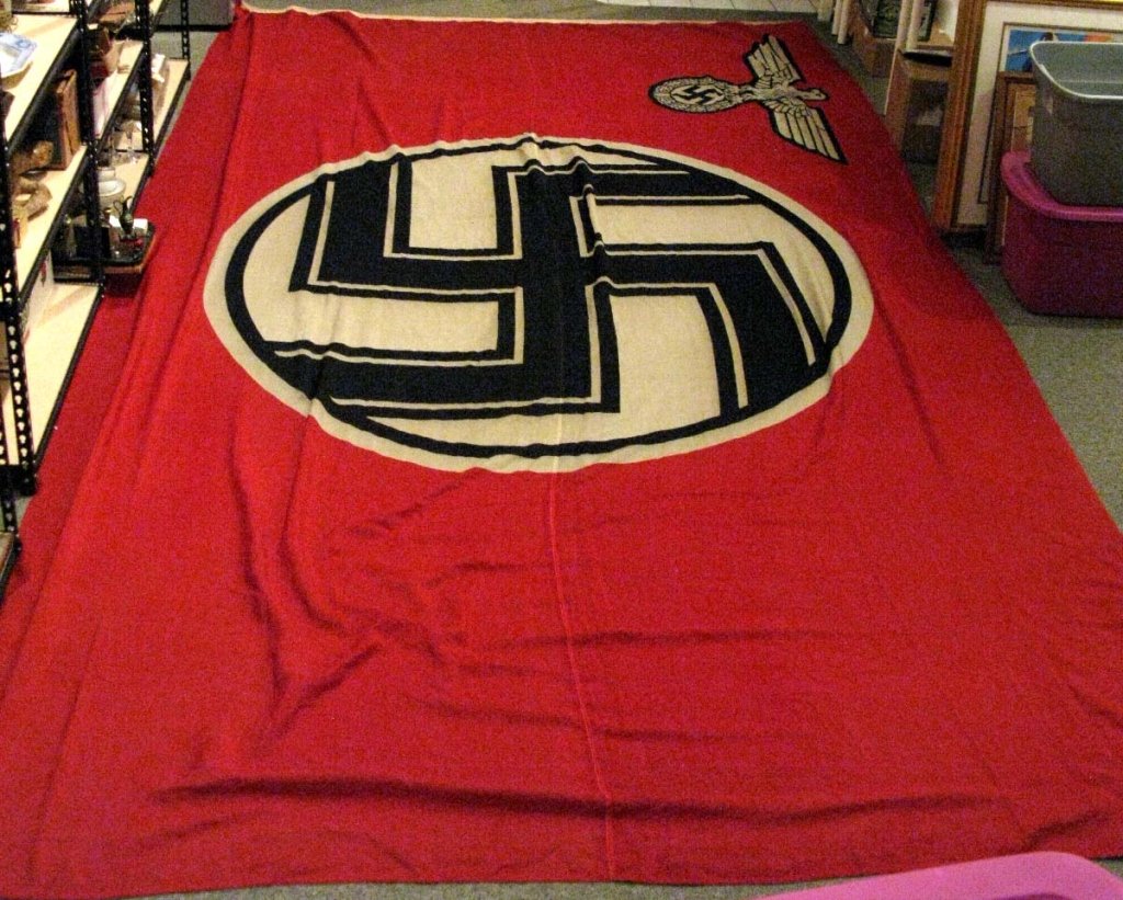 LARGE WWII GERMAN NAZI BUILDING FLAG 15' x 9': LARGE WWII GERMAN NAZI BUILDING FLAG (Original WW2 German NSDAP State Service Flag): German state building flag, with the state eagle in the corner, One end with a rope sewn in with loops for hanging,