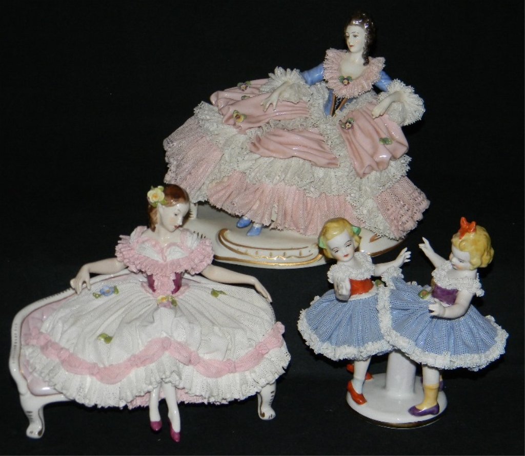 3 DRESDEN GERMAN LACE FIGURINES ONE BY VOLKSTEDT: 2 DRESDEN LACE FIGURINES ONE BY VOLKSTEDT: 1.) German Volkstedt Porcelain figurine sitting on settee in white lace dress with pink lace ruffles, 5.5" h x 7" l x 4.25" w (13.97 cm x 17.78 cm x 10.8 cm)