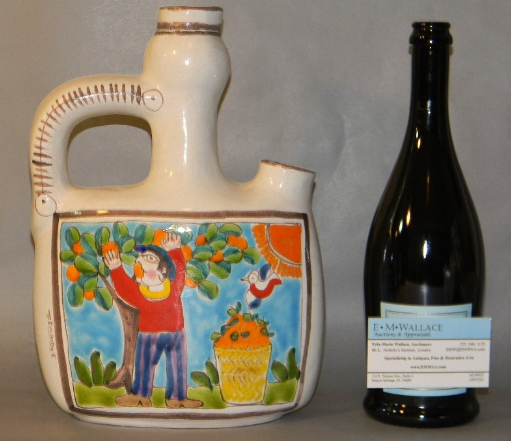 DE SIMONE VINTAGE ITALIAN MAJOLICA JUG SHAPED VASE: Giovanni De Simone (1930 - 1991) Italian mid-century majolica ceramic jug shaped vase with pour spout. The flattened sides vibrantly hand-painted. One side with the image of someone harvesting oranges