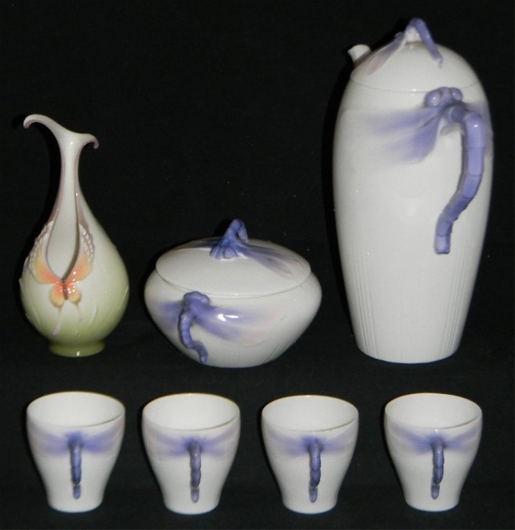 RORSTRAND DRAGONFLY PORCELAIN COFFEE POT & CUPS: Rorstrand, Swedish Porcelain Partial Coffee Service in the "Dragonfly" pattern, c. 1900, to include: 1.) Coffee Pot (9"h). 2.) Double-Handled Sugar, 4"h x 5.5"l. 3.) Four Cups (2.375"h). Also included