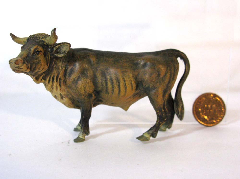 AUSTRIAN COLD PAINTED BRONZE BULL: Austrian cold painted bronze figure of a bull, exceptionally well painted, 2.125"h x 3.375"l. PROVENANCE: 2nd generation collection from a noted television writer and his father.