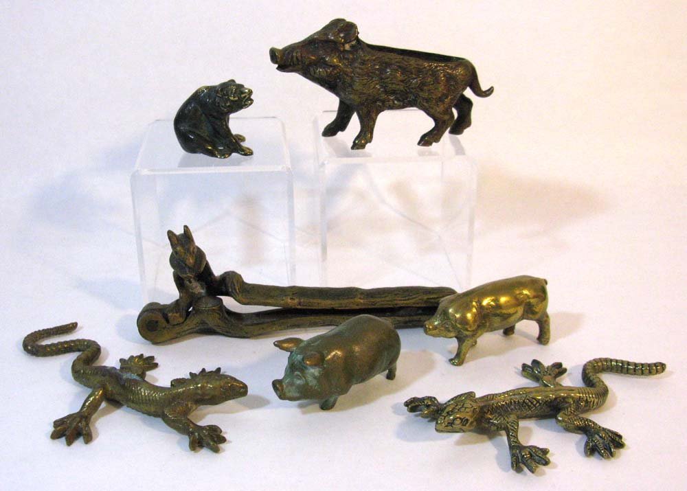 COLLECTION SIX BRONZE AND BRASS ANIMAL FORMS: A collection of antique and vintage bronze and brass animal form objects, to include: 1.) Vienna bronze wild boar pen nib wipe. 2.375"h x 4"l. 2.) Solid cast bronze pig with verdigris patina, 1"h. 3.)