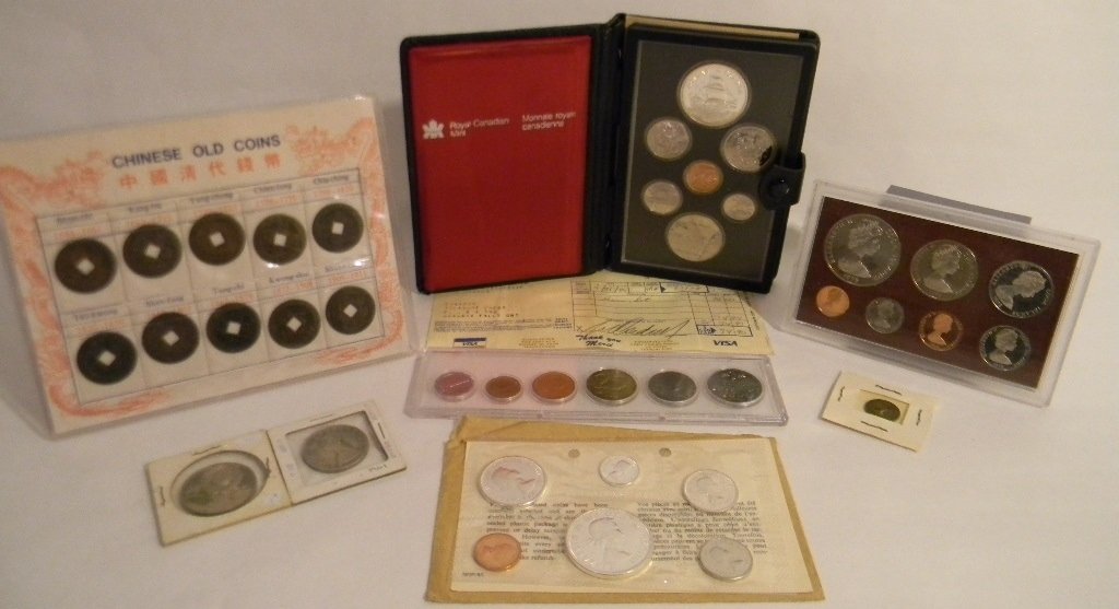 COINS: CANADA, ITALY & UK SILVER & WORLD COINS: 1.) Royal Canadian Mint 1979 Proof Set. This is the only set available which contains both the 1976 silver and nickel dollars. The set: 2 @ Dollars, .50 cents, .25 cents, .10 cents, .5 cents and .1 ce