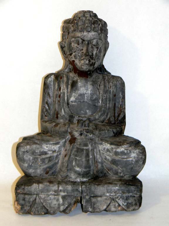 SOUTHEAST ASIAN 17th c - 18th c WOOD BUDDHA: Carved and polychrome wood Southeast Asian Buddha is shown seated on a lotus flower with his hands in a Mudra of supreme enlightenment. He has curled hair with downcast eyes, arched eyebrows, and elon