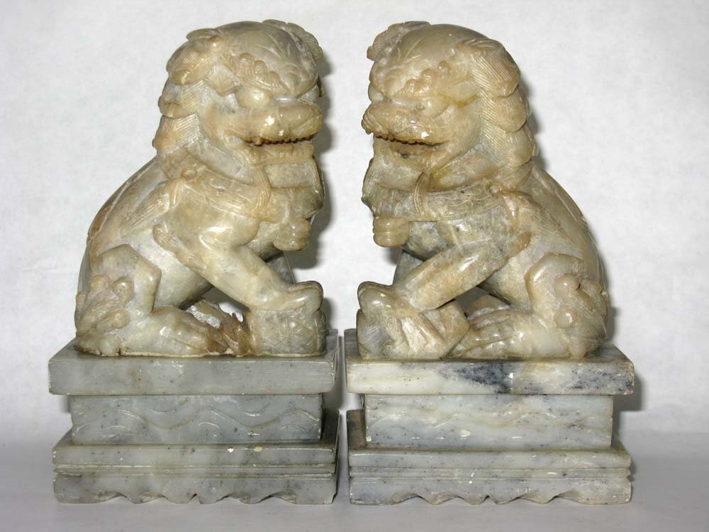 PAIR CHINESE CARVED STONE MALE & FEMALE FOO DOGS: Pair of Chinese carved stone male and female protective Foo Dogs, 5.75"h. PROVENANCE: From an established collection created over fifty years ago by a dedicated collector of Asian arts and rarely adde
