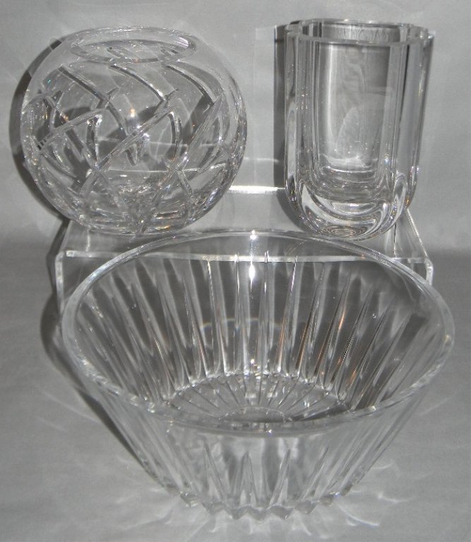 3 CRYSTAL GLASS VASES Kosta Boda, Val. St. Lambert: Kosta Boda "Laguna" crystal vase, engraved, "Kosta Boda #48440 G Warff," 6.625"h (16.82cm). Atlantis Crystal Vase, etched signature, 6"h. 3.) Val St. Lambert Bowl, 4.25"h x 9.75"d.
