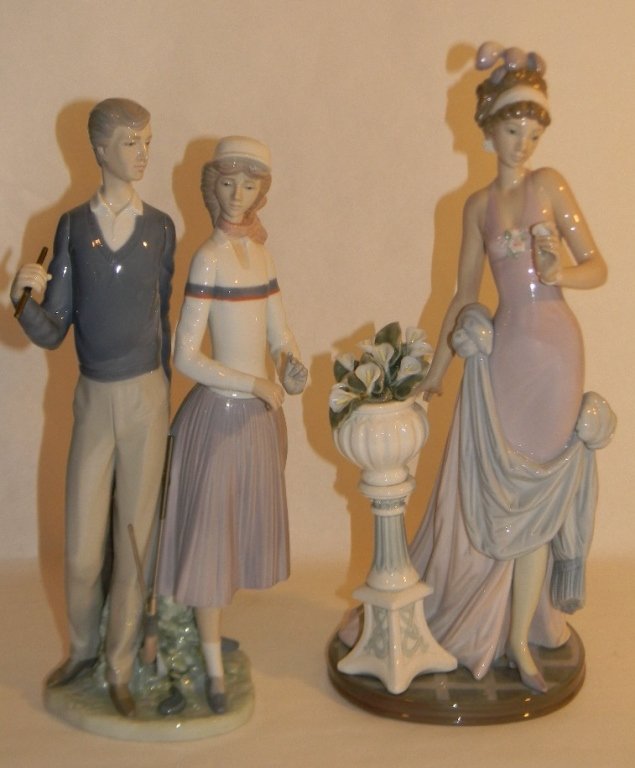 LLADRO PORCELAIN TOUCH OF CLASS 05377 GOLFING 1453: Two Lladro porcelain sculptures, to include: "A Touch of Class" #05377; 1986 - 2001, modeled by Jose Puche, 15"h. 2.) Lladro porcelain Golfing Couple, #1453; 1983 - 1992, Modeled by Jose Puche, 13.5"h