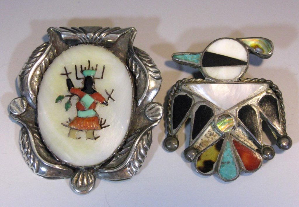 2 ZUNI STERLING & STONE INLAY BROOCHES: A pair of vintage, Native American, Zuni inlay brooches on sterling. 1.) Zuni bird brooch, sterling base with turquoise, onyx, tortoise shell, spiny oyster and mother-of-pearl stone inlay, 1.5"h. 2.)