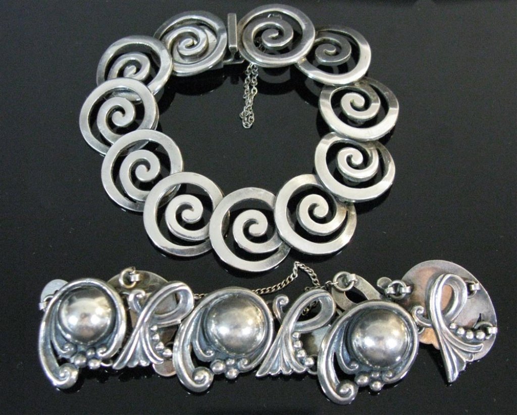 TWO LOS CASTILLO TAXCO STERLING SILVER BRACELETS: A pair of sterling silver bracelets by Taxco silversmith, Los Castillo, both c. 1950s, to include: 1.) Superb, sculptural bracelet wit alternating sterling links, 7"l, impressed, "LOS CASTILLO TAXCO M
