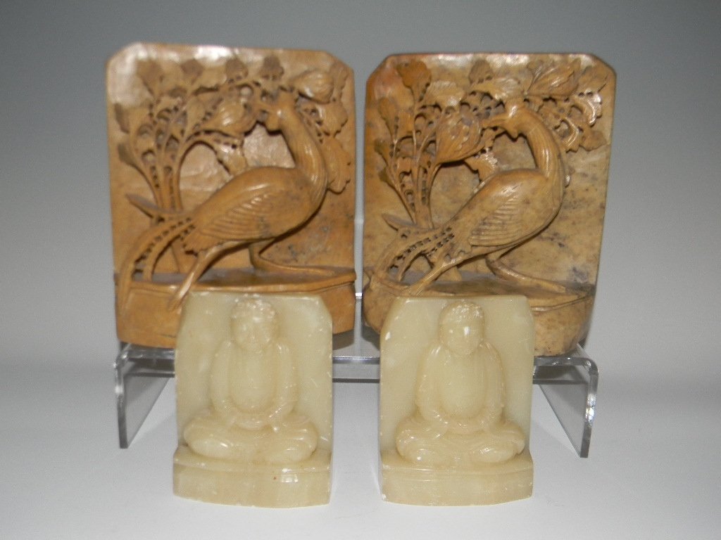 2 PAIRS CHINESE CARVED SOAPSTONE BOOKENDS: Two pairs of Chinese carved soapstone bookends, circa 1895 - 1920. 1.) Pair of large bookends with birds and flowering bushes, 7"h x 6"w. 2.) Pair of light green, almost translucent bookends each with