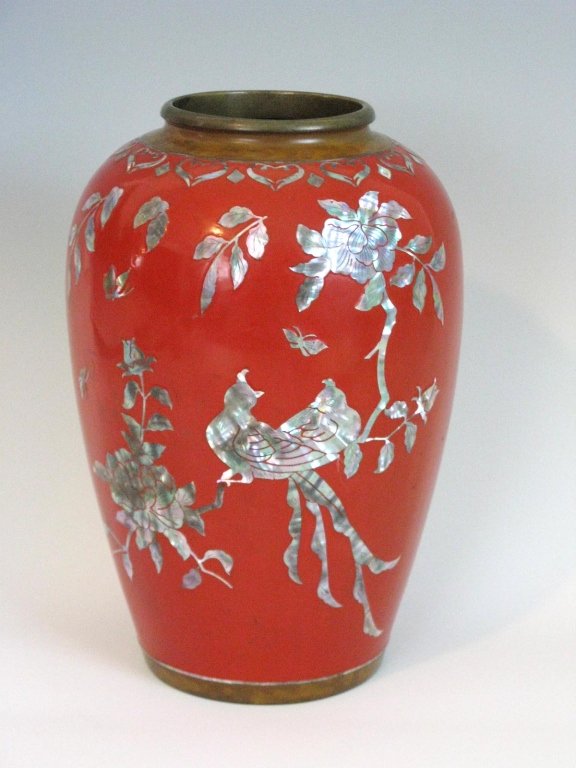 VINTAGE CHINESE RED ENAMEL & MOTHER OF PEARL VASE: Vintage Chinese vase in red lacquer enamel and mother of pearl (abalone) on a patinated brass body. The finely cut and incised abalone depicts two birds amongst flowers, 8.5"h. PROVENANCE: From an est