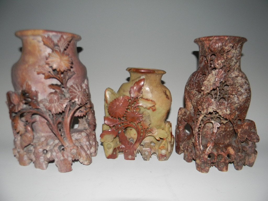 3 CHINESE CARVED SOAPSTONE VASES WITH FLOWERS: Collection of 3 Chinese carved soapstone vases with flowers. 1.) Large and well carved with reticulation depicting a bird amongst flowers, 8.5"h. c. 1900 - 1920. 2.) Tall vase carved in a mottled sand
